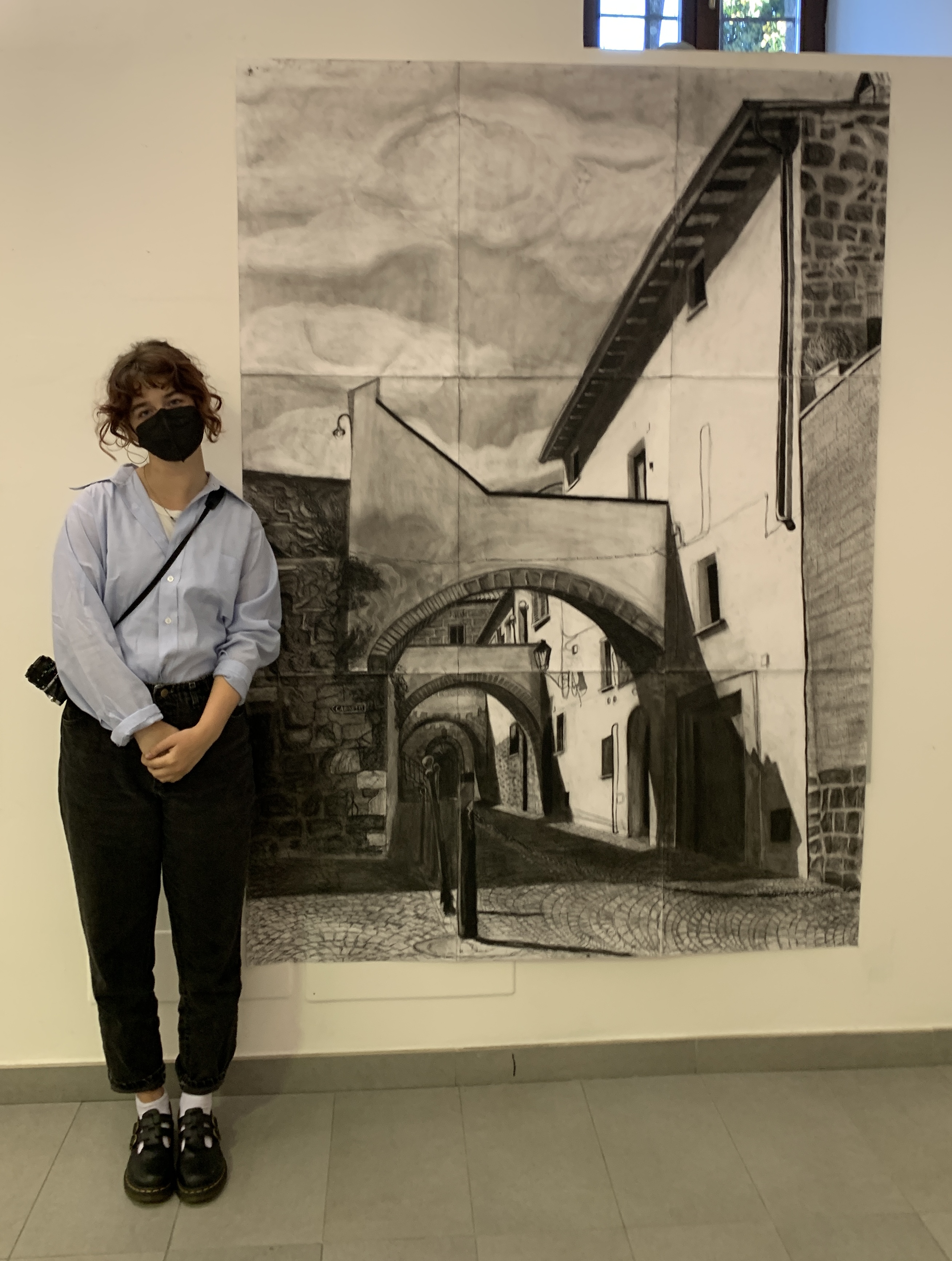 me standing next to drawing