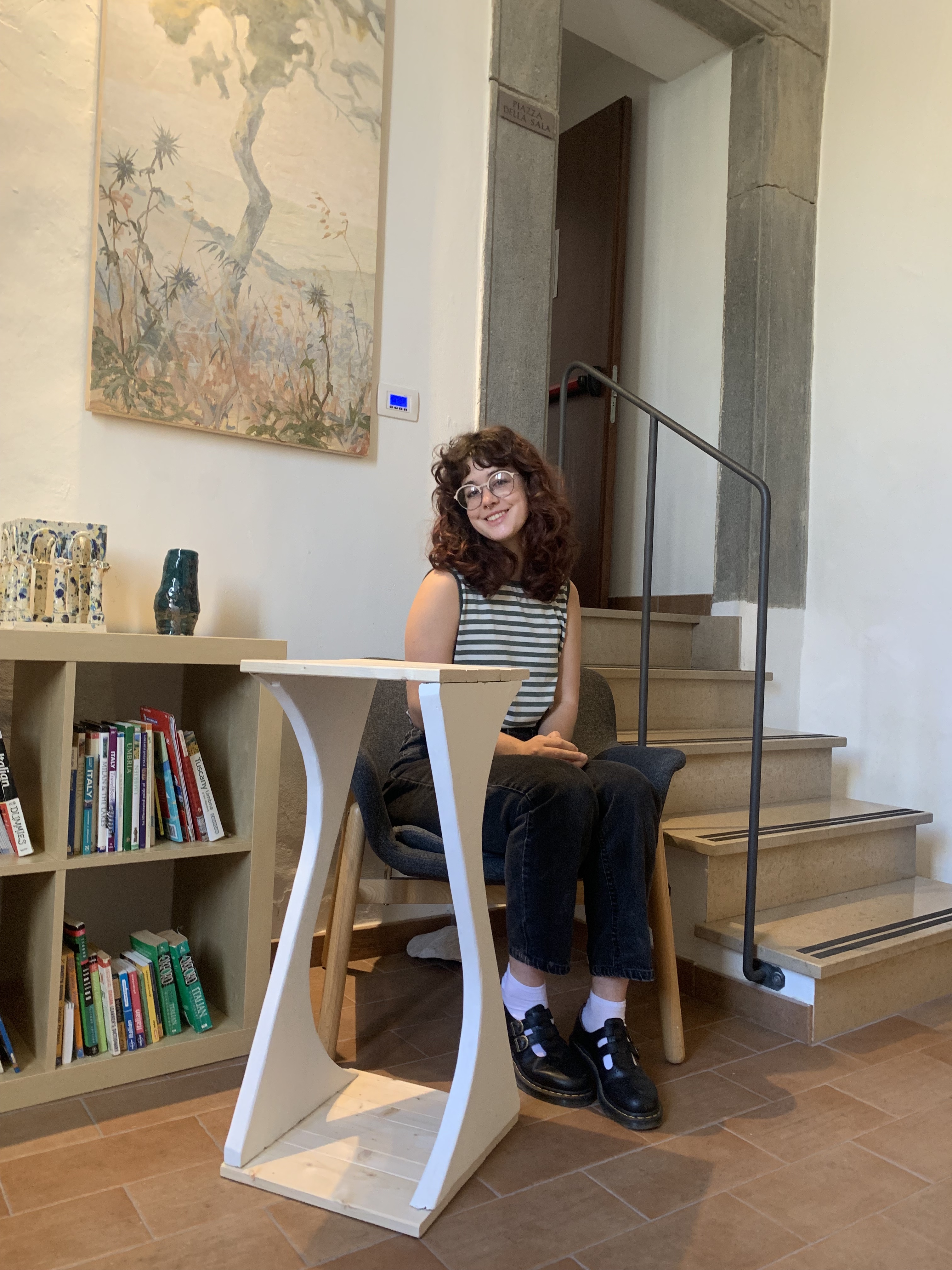 Abigail sitting with table